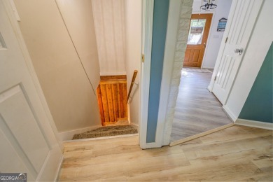 Completely renovated waterfront ranch home with a fully finished on Turtle Cove Golf Course in Georgia - for sale on GolfHomes.com, golf home, golf lot