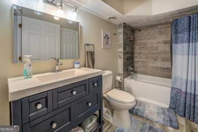 Completely renovated waterfront ranch home with a fully finished on Turtle Cove Golf Course in Georgia - for sale on GolfHomes.com, golf home, golf lot