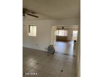 You don't want to miss this perfect location. Entertainment on Sun City Lakes West and East in Arizona - for sale on GolfHomes.com, golf home, golf lot