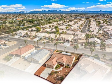 Tucked away in a quiet cul-de-sac in the desirable Desert Lakes on Desert Lakes Golf Course in Arizona - for sale on GolfHomes.com, golf home, golf lot