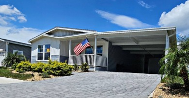 Luxury water views in Unique and Prestigious 55 + Riverside Golf on The Riverside Golf Club in Florida - for sale on GolfHomes.com, golf home, golf lot