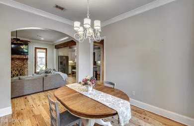 Welcome to this beautifully designed 4-bedroom, 2.5-bath home on Lake Caroline Golf Club in Mississippi - for sale on GolfHomes.com, golf home, golf lot