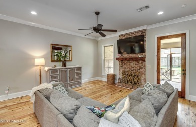 Welcome to this beautifully designed 4-bedroom, 2.5-bath home on Lake Caroline Golf Club in Mississippi - for sale on GolfHomes.com, golf home, golf lot
