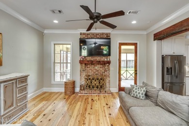Welcome to this beautifully designed 4-bedroom, 2.5-bath home on Lake Caroline Golf Club in Mississippi - for sale on GolfHomes.com, golf home, golf lot