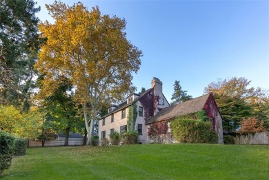 This magnificent 5-to-6-bedroom stately stucco home is unique in on Ardsley Country Club in New York - for sale on GolfHomes.com, golf home, golf lot