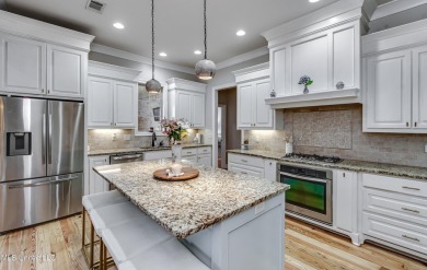 Welcome to this beautifully designed 4-bedroom, 2.5-bath home on Lake Caroline Golf Club in Mississippi - for sale on GolfHomes.com, golf home, golf lot