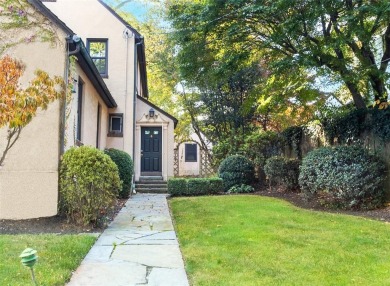 This magnificent 5-to-6-bedroom stately stucco home is unique in on Ardsley Country Club in New York - for sale on GolfHomes.com, golf home, golf lot