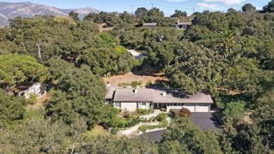 A remodeled quintessential Hope Ranch cottage set on a quiet on La Cumbre Country Club in California - for sale on GolfHomes.com, golf home, golf lot