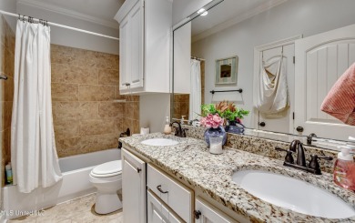 Welcome to this beautifully designed 4-bedroom, 2.5-bath home on Lake Caroline Golf Club in Mississippi - for sale on GolfHomes.com, golf home, golf lot