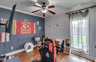 Welcome to this beautifully designed 4-bedroom, 2.5-bath home on Lake Caroline Golf Club in Mississippi - for sale on GolfHomes.com, golf home, golf lot