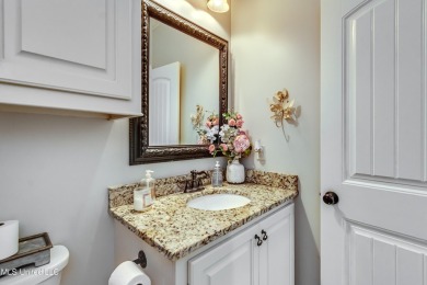 Welcome to this beautifully designed 4-bedroom, 2.5-bath home on Lake Caroline Golf Club in Mississippi - for sale on GolfHomes.com, golf home, golf lot