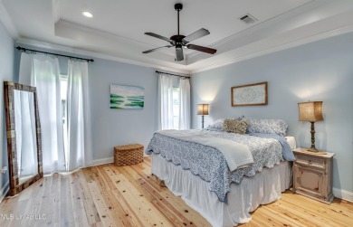 Welcome to this beautifully designed 4-bedroom, 2.5-bath home on Lake Caroline Golf Club in Mississippi - for sale on GolfHomes.com, golf home, golf lot