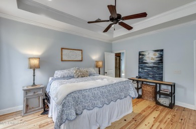 Welcome to this beautifully designed 4-bedroom, 2.5-bath home on Lake Caroline Golf Club in Mississippi - for sale on GolfHomes.com, golf home, golf lot