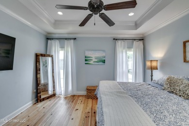 Welcome to this beautifully designed 4-bedroom, 2.5-bath home on Lake Caroline Golf Club in Mississippi - for sale on GolfHomes.com, golf home, golf lot