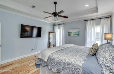 Welcome to this beautifully designed 4-bedroom, 2.5-bath home on Lake Caroline Golf Club in Mississippi - for sale on GolfHomes.com, golf home, golf lot
