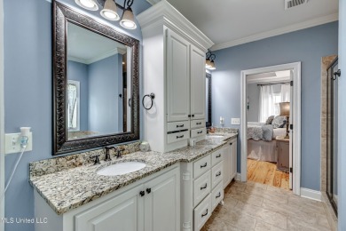 Welcome to this beautifully designed 4-bedroom, 2.5-bath home on Lake Caroline Golf Club in Mississippi - for sale on GolfHomes.com, golf home, golf lot