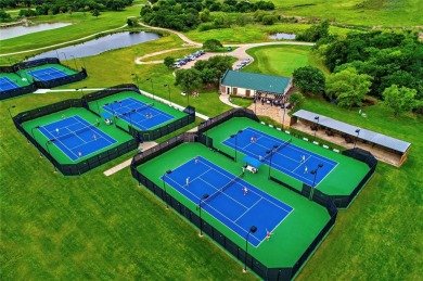 Stunning two-story Highland Home featuring a fantastic floor on The Lakes at Castle Hill Golf Club in Texas - for sale on GolfHomes.com, golf home, golf lot