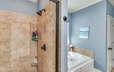 Welcome to this beautifully designed 4-bedroom, 2.5-bath home on Lake Caroline Golf Club in Mississippi - for sale on GolfHomes.com, golf home, golf lot