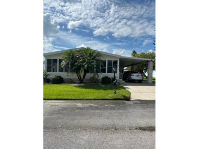 Welcome to this stunning and spacious home located in The on Hamptons Golf Club in Florida - for sale on GolfHomes.com, golf home, golf lot