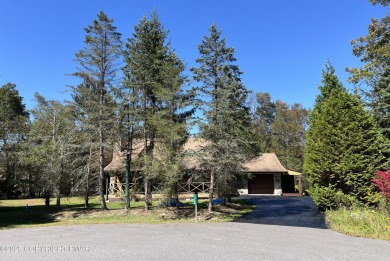 Immaculate Log Cabin in Pocono Farms Country Club Association - on Pocono Farms Country Club in Pennsylvania - for sale on GolfHomes.com, golf home, golf lot