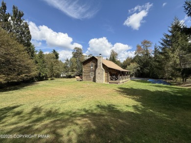 Immaculate Log Cabin in Pocono Farms Country Club Association - on Pocono Farms Country Club in Pennsylvania - for sale on GolfHomes.com, golf home, golf lot