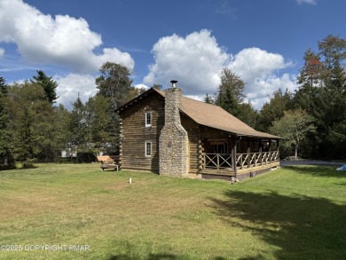 Immaculate Log Cabin in Pocono Farms Country Club Association - on Pocono Farms Country Club in Pennsylvania - for sale on GolfHomes.com, golf home, golf lot