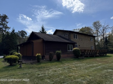 Immaculate Log Cabin in Pocono Farms Country Club Association - on Pocono Farms Country Club in Pennsylvania - for sale on GolfHomes.com, golf home, golf lot