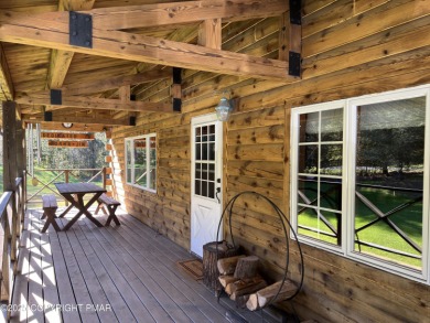 Immaculate Log Cabin in Pocono Farms Country Club Association - on Pocono Farms Country Club in Pennsylvania - for sale on GolfHomes.com, golf home, golf lot