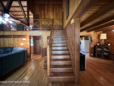 Immaculate Log Cabin in Pocono Farms Country Club Association - on Pocono Farms Country Club in Pennsylvania - for sale on GolfHomes.com, golf home, golf lot