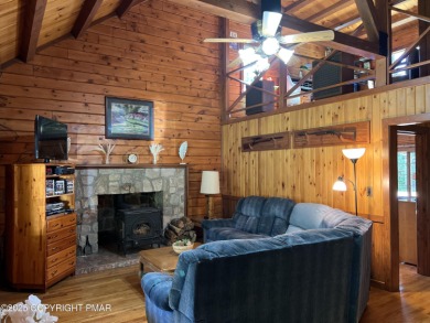 Immaculate Log Cabin in Pocono Farms Country Club Association - on Pocono Farms Country Club in Pennsylvania - for sale on GolfHomes.com, golf home, golf lot