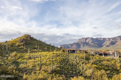 Nestled in a serene, gated community on a near-acre lot on Gold Canyon Golf Resort - Dinosaur Mountain in Arizona - for sale on GolfHomes.com, golf home, golf lot