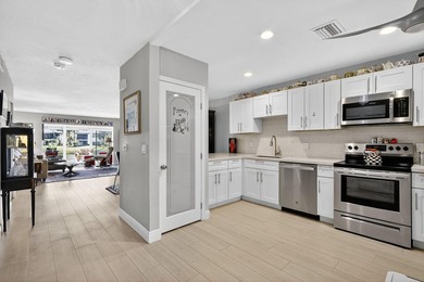 This beautifully redone two-bedroom, two-bath condo offers a on Hunters Run Golf and Country Club in Florida - for sale on GolfHomes.com, golf home, golf lot