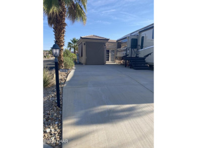 Welcome to the gated community of Havasu RV Resort. This resort on The Refuge Golf and Country Club in Arizona - for sale on GolfHomes.com, golf home, golf lot