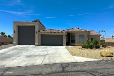 A Stunning RV Garage Pool Home in Lake Havasu City. Nestled on a on London Bridge Golf Course in Arizona - for sale on GolfHomes.com, golf home, golf lot