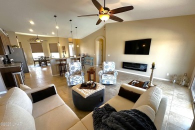 A Stunning RV Garage Pool Home in Lake Havasu City. Nestled on a on London Bridge Golf Course in Arizona - for sale on GolfHomes.com, golf home, golf lot