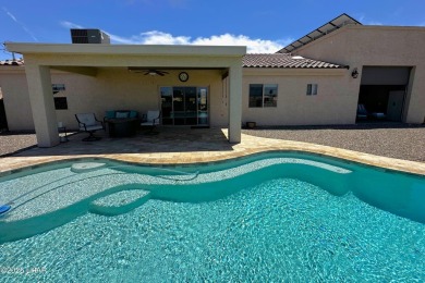A Stunning RV Garage Pool Home in Lake Havasu City. Nestled on a on London Bridge Golf Course in Arizona - for sale on GolfHomes.com, golf home, golf lot