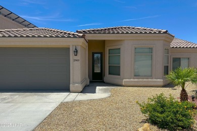 A Stunning RV Garage Pool Home in Lake Havasu City. Nestled on a on London Bridge Golf Course in Arizona - for sale on GolfHomes.com, golf home, golf lot