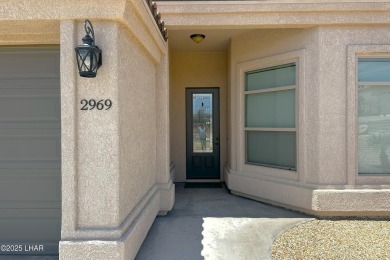 A Stunning RV Garage Pool Home in Lake Havasu City. Nestled on a on London Bridge Golf Course in Arizona - for sale on GolfHomes.com, golf home, golf lot