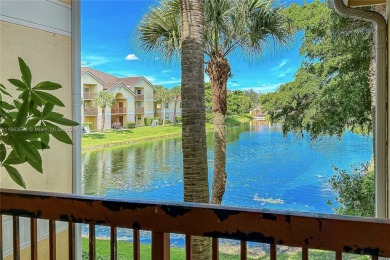 PRICED TO SELL !  Community is undergoing a COMPLETE MAKEOVER ! on Woodmont Country Club in Florida - for sale on GolfHomes.com, golf home, golf lot