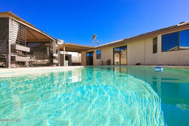 This 3-bedroom, 2-bath pool home is conveniently located in on London Bridge Golf Course in Arizona - for sale on GolfHomes.com, golf home, golf lot