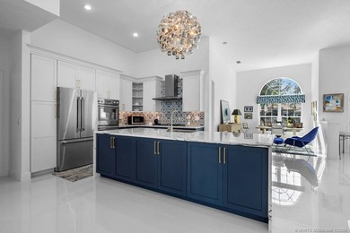 Embrace this beautiful crisp clean home with a harmonious on Monarch Country Club in Florida - for sale on GolfHomes.com, golf home, golf lot