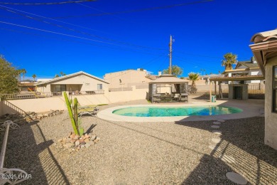 This 3-bedroom, 2-bath pool home is conveniently located in on London Bridge Golf Course in Arizona - for sale on GolfHomes.com, golf home, golf lot