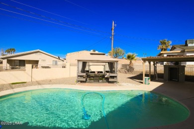 This 3-bedroom, 2-bath pool home is conveniently located in on London Bridge Golf Course in Arizona - for sale on GolfHomes.com, golf home, golf lot