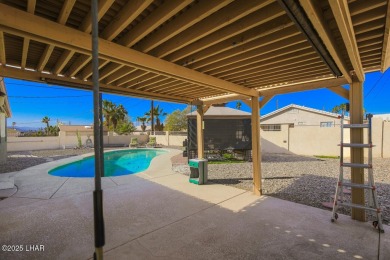 This 3-bedroom, 2-bath pool home is conveniently located in on London Bridge Golf Course in Arizona - for sale on GolfHomes.com, golf home, golf lot