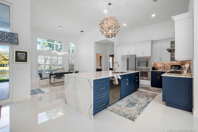 Embrace this beautiful crisp clean home with a harmonious on Monarch Country Club in Florida - for sale on GolfHomes.com, golf home, golf lot