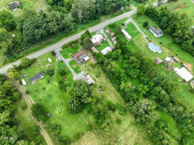 Two properties, one great opportunity! Here's your chance to own on Country Club of Bristol in Tennessee - for sale on GolfHomes.com, golf home, golf lot