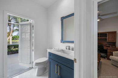 Embrace this beautiful crisp clean home with a harmonious on Monarch Country Club in Florida - for sale on GolfHomes.com, golf home, golf lot