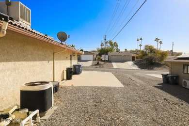 This 3-bedroom, 2-bath pool home is conveniently located in on London Bridge Golf Course in Arizona - for sale on GolfHomes.com, golf home, golf lot