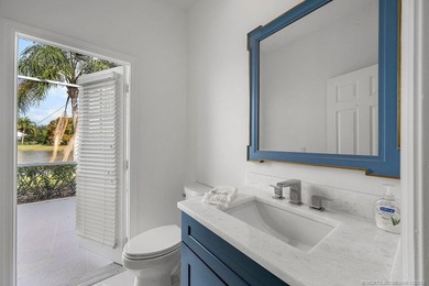 Embrace this beautiful crisp clean home with a harmonious on Monarch Country Club in Florida - for sale on GolfHomes.com, golf home, golf lot