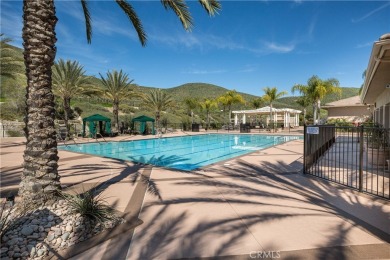 For Information Call Bill Robinson : This home is thoughtful in on Menifee Lakes Country Club - Lakes in California - for sale on GolfHomes.com, golf home, golf lot